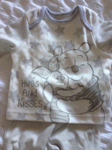 Bad photo but Winnie the Pooh PJ's from our neighbours (Asda I think)