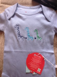 Cute, organic giraffe babygro from a friend's mum - from Piccalilly