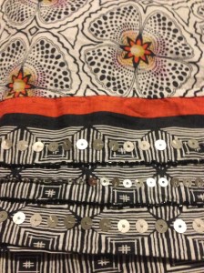 I LOVE the fabric and sequin detail on the Red Herring dress