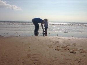 W's cousin and bampa at Porthcawl beach