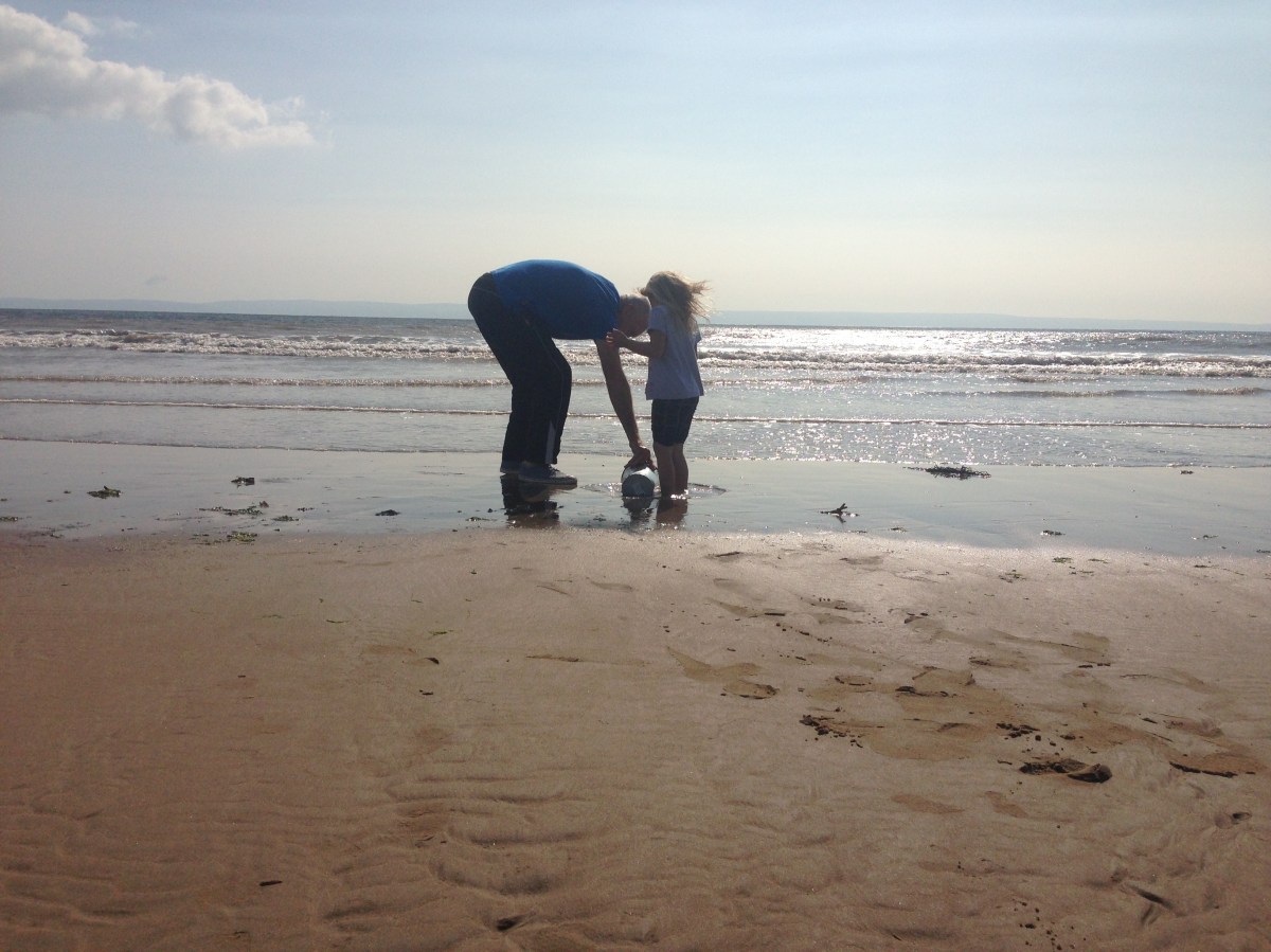 W's cousin and bampa at Porthcawl beach