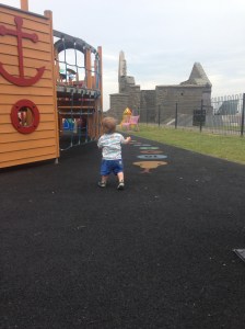 Toddling around Aberystwyth castle in his first shoes!