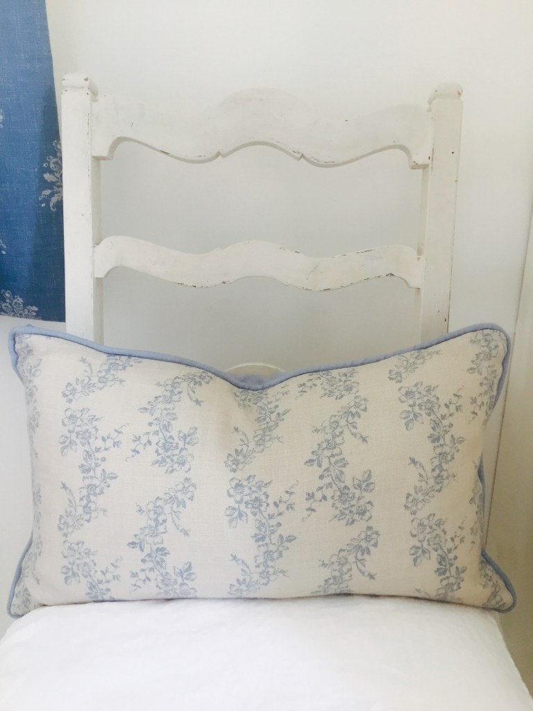 shabby chic white chair blue cushion